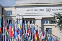 flags of countries in front of the united nations office at geneva