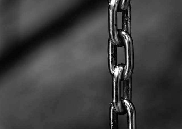 grayscale photography of chain