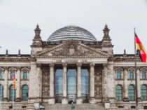 A German flag near a building