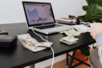 money with laptop