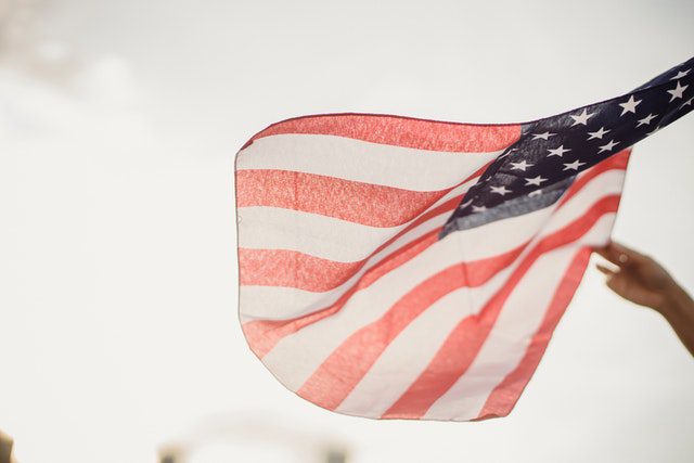 Person Holding An American Flag