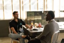 Two men discussing