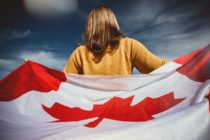 pexels-woman holding canadian flag