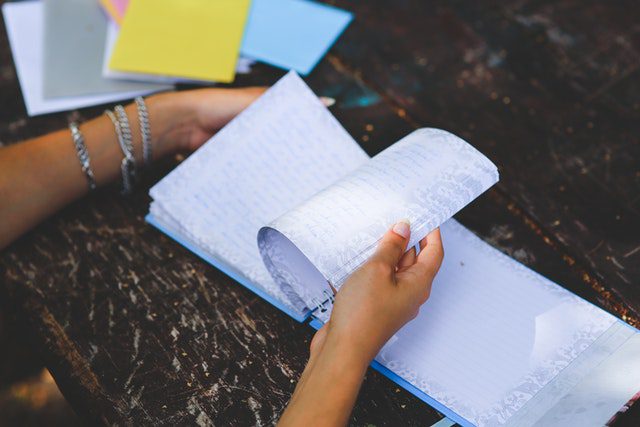 Pexels - Notebook in hands