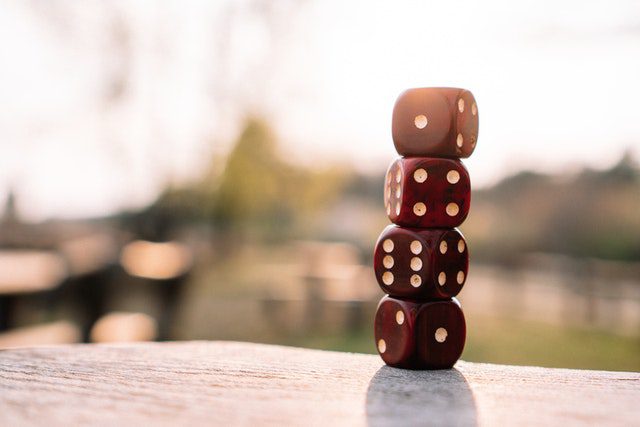 Pexels - Stacked dice on a table