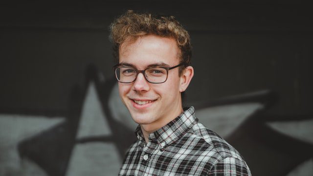 A student smiling