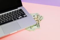 Pexels - silver laptop with US dollar bills