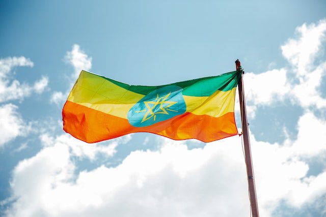 Pexels - National colorful flag of Ethiopia under cloudy sky