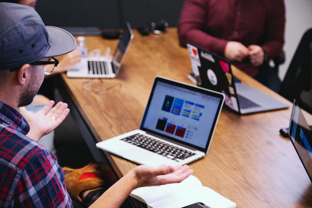 Unsplash - A man pressing a laptop