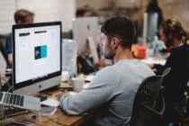 Unsplash - A man working on a computer in an office environment