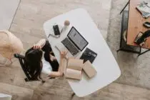 Pexels - lady using laptop in modern workspace