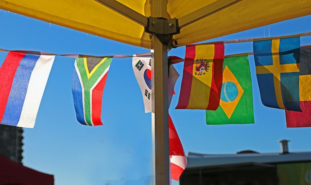 Unsplash - country flags on a rope-like hanger