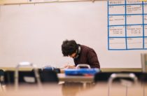 Pexels - Man Writing on Table