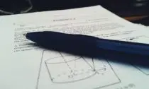 Black Ballpoint on Top of White Printer Paper