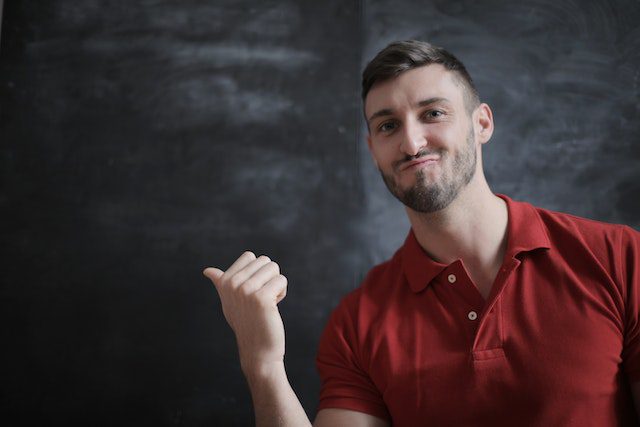 Student in front of board