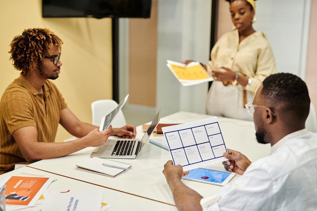 Pexels - A Group of 3 People Having a Meeting