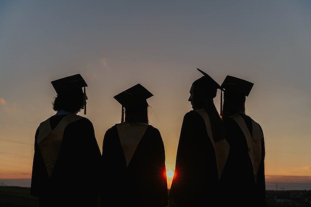 Silhouette of People Wearing Graduation