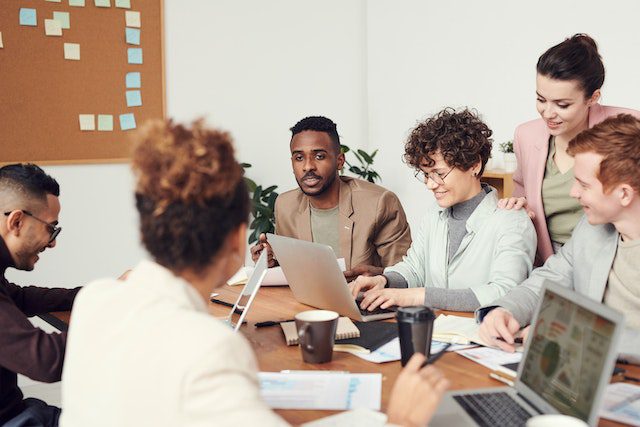 Pexels - Diverse group of people having a conversation