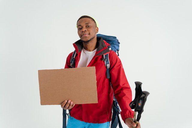 A student carrying a laptop