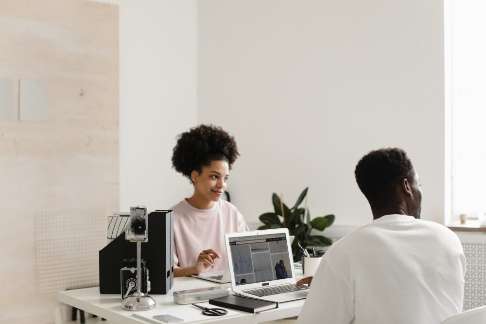 two people working on their laptop