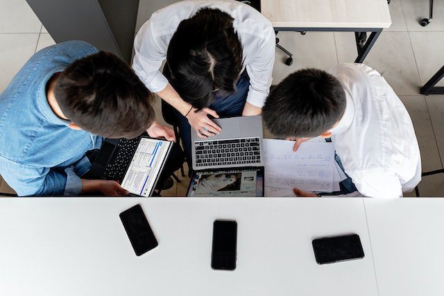Pexels - People Working on Laptops