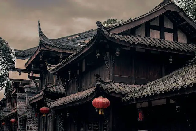 closeup photo of brown and black wooden houses digital wallpaper