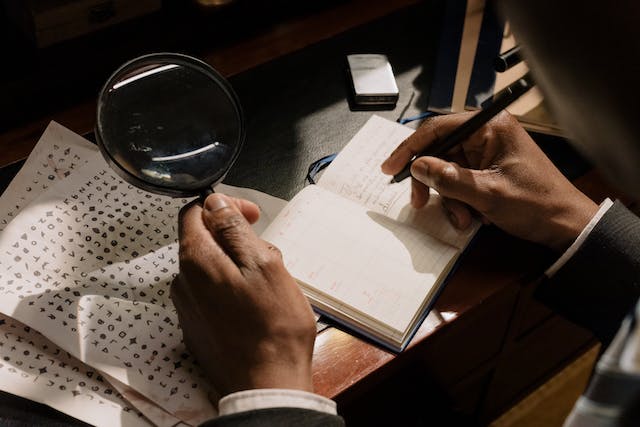 photo of person taking down notes