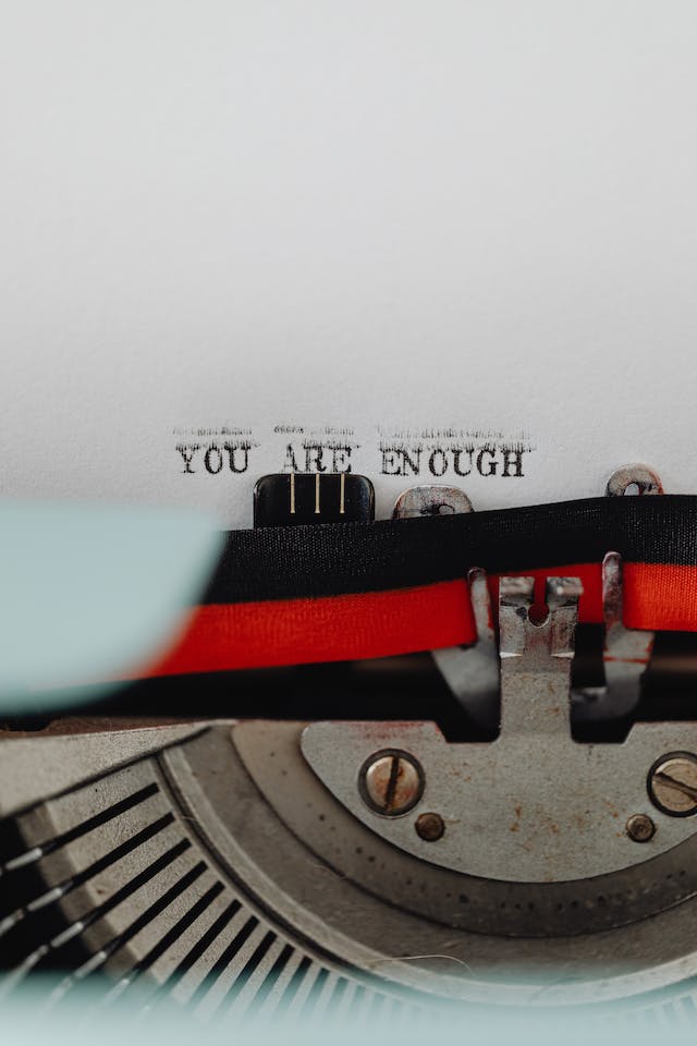 inspirational phrase coming out of a typewriter