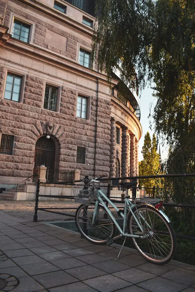 a bicycle parked on a sidewalk