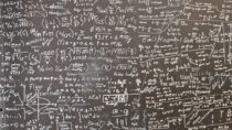 a blackboard with a lot of writing on it