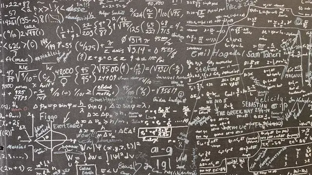 a blackboard with a lot of writing on it