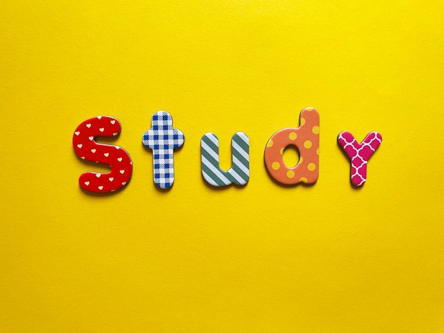 a yellow background with the word study spelled out