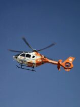 aerial medical helicopter in clear blue sky