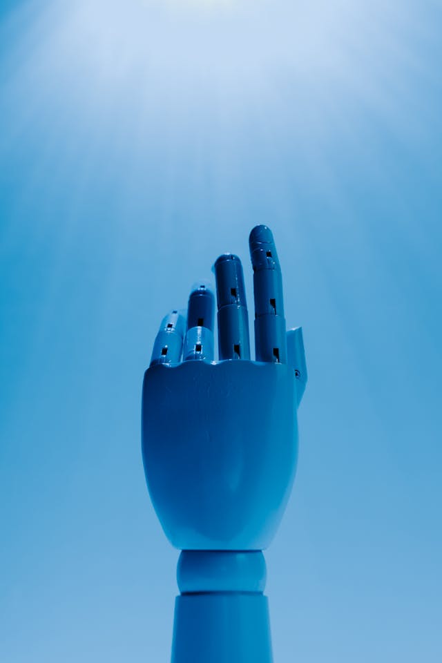 hand on blue background