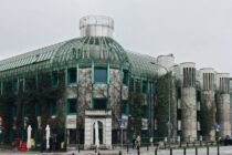 warsaw university library building with plants growing on walls