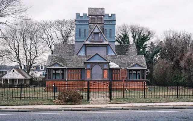 a unique building with a tower stands tall