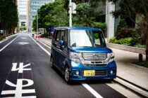blue honda minivan during daytime