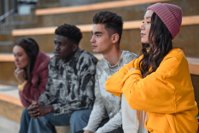 people sitting on bench
