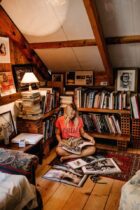 photo of woman reading magazine