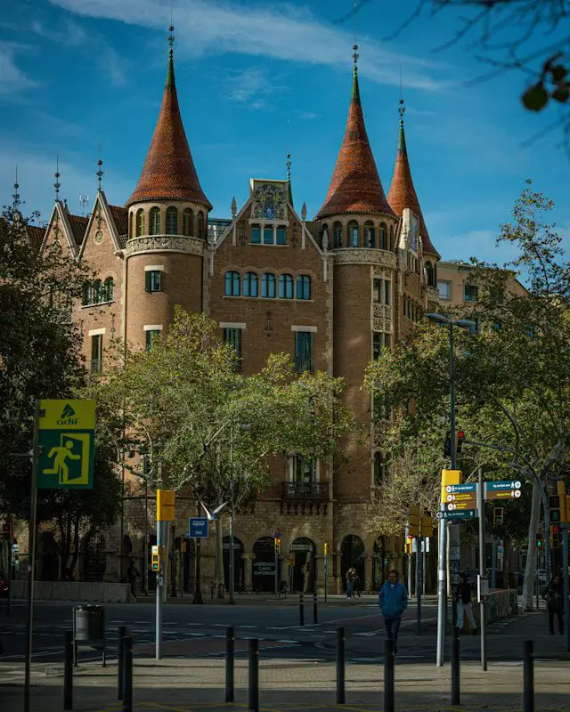 a large building with two towers on top of it