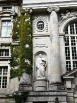 a statue in front of a building