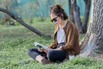 girl book sunglasses casual