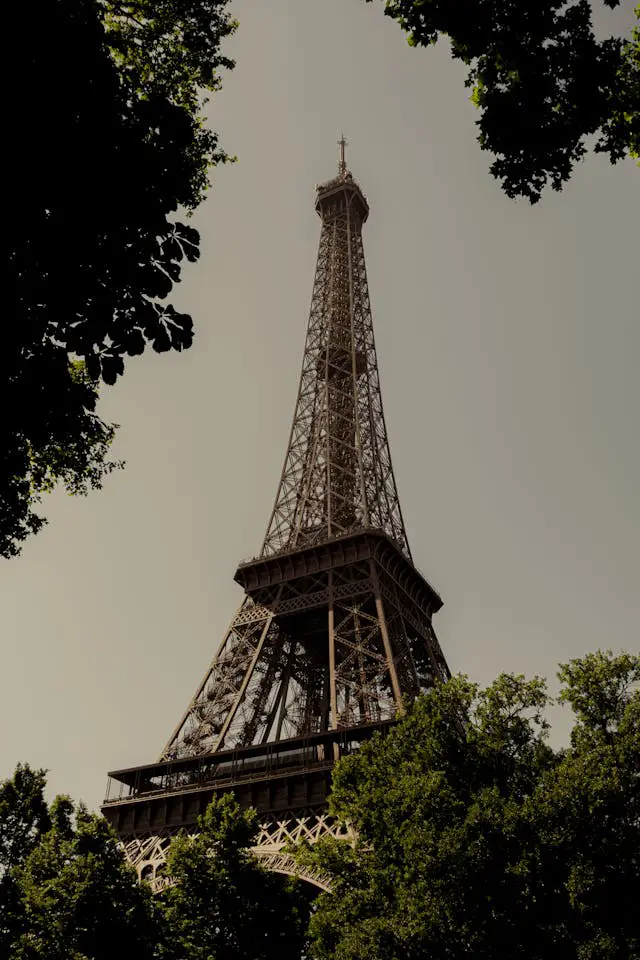 iconic eiffel tower in summer foliage