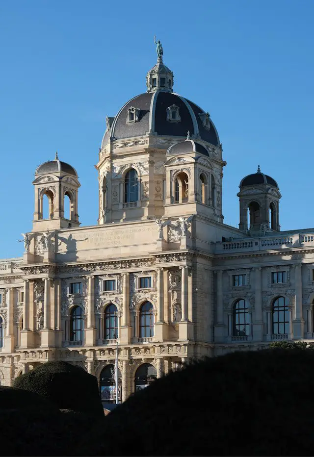 a large building with a clock on the top of it