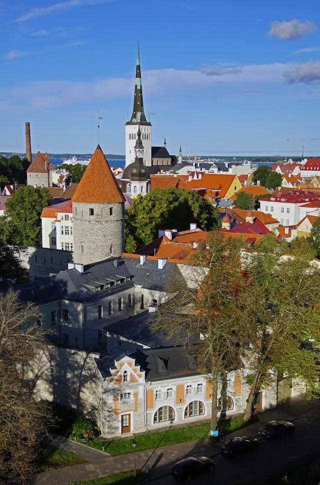 an aerial view of a city with tall buildings