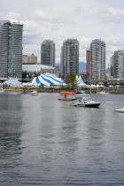 boats sailing on river in city