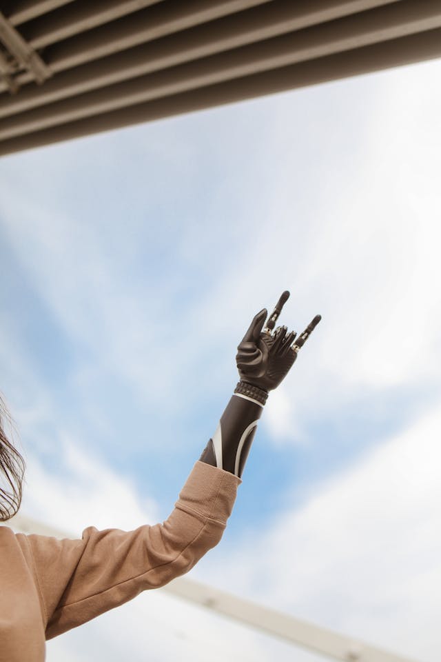 gesturing with prostethic arm