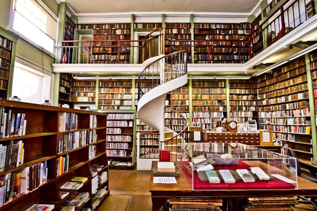 historic library interior with spiral staircase