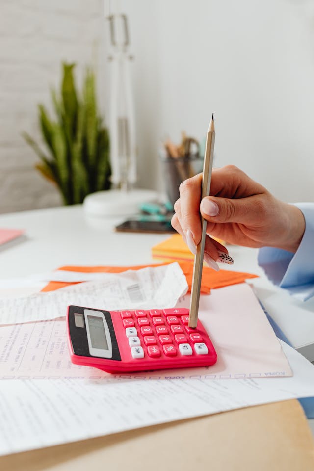person holding brown pencil