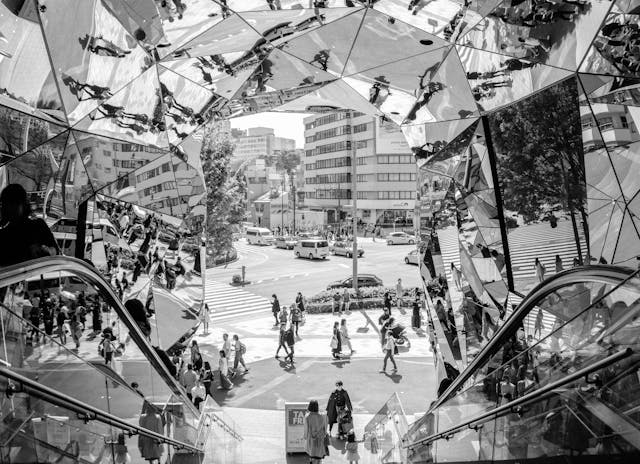reflections and movement in urban mirror tunnel
